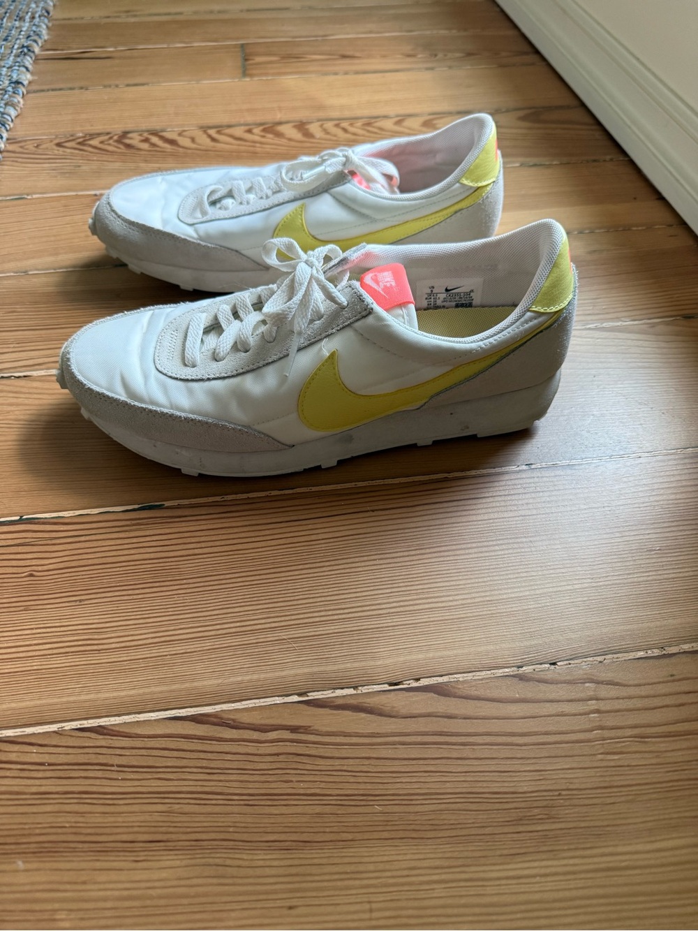 Nike Women’s Retro Runner Sneakers in White with Yellow Swoosh and Pink Tongue